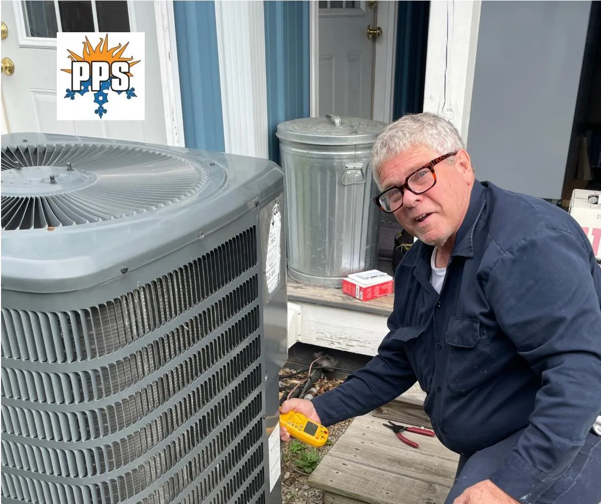 Polley's technician running AC diagnostics on a residential unit in Plainfield