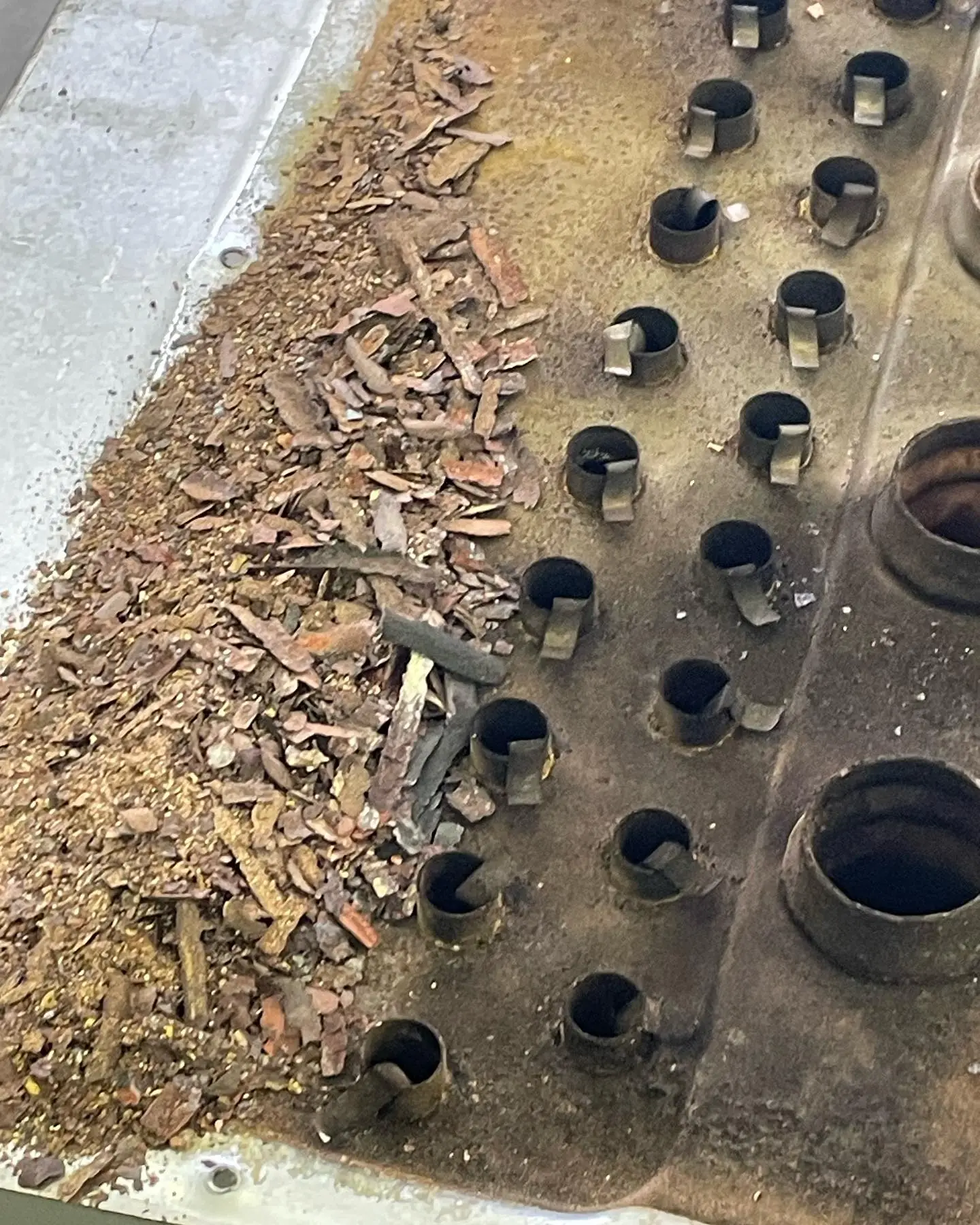 Cracked furnace heat exchanger pulled from a Plainfield, IN home during a repair diagnosis