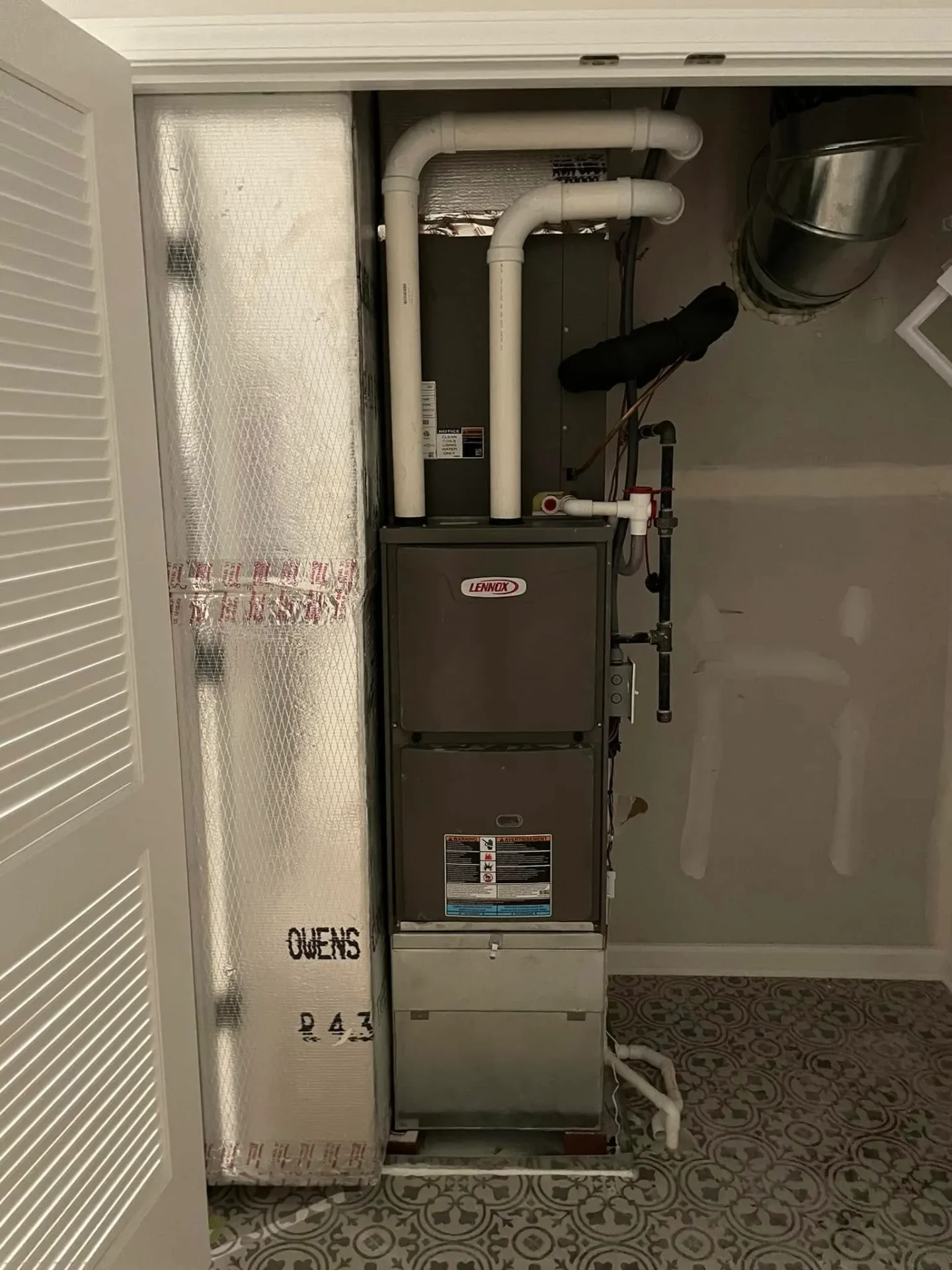 Lennox high-efficiency furnace installed in a closet by Polley's Perfect Seasons in Plainfield, IN