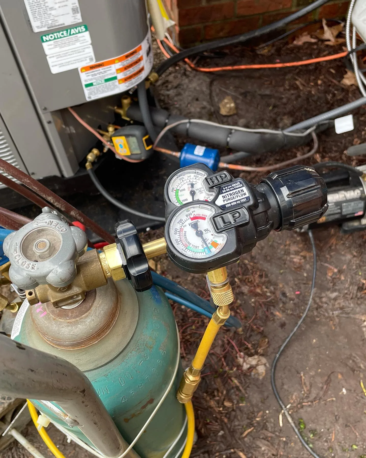 Nitrogen purge with tank and gauges during an AC install in Plainfield, IN