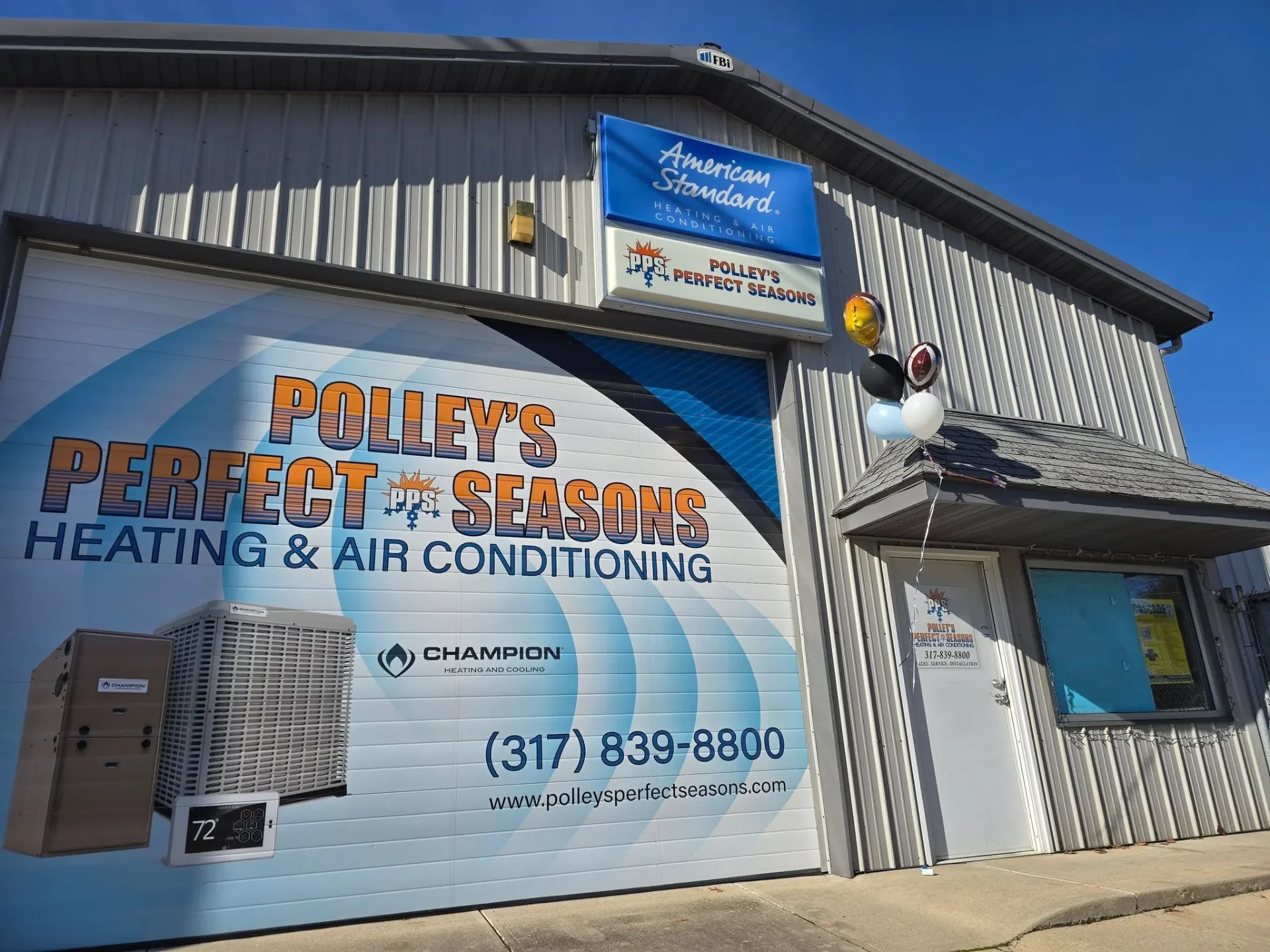 Polley's Perfect Seasons shop exterior with branded garage door in Plainfield, IN